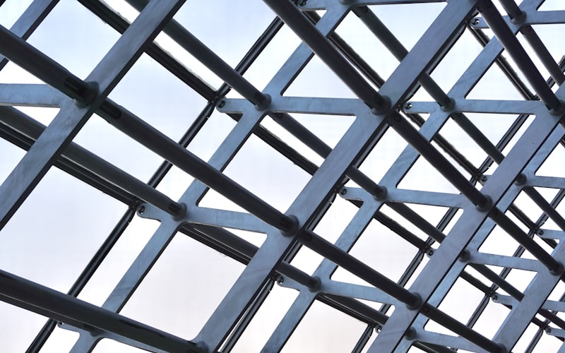 Interlocking steel structural framework against the sky